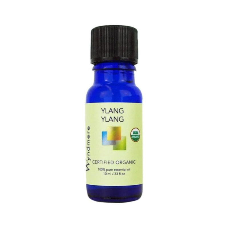 Ylang Ylang - 10ml cobalt blue bottle of Wyndmere Certified Organic Ylang Ylang Essential Oil that has an intensely sweet, floral aroma