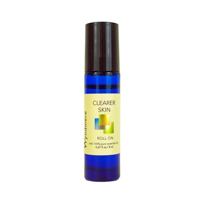 An 8ml cobalt blue roll-on bottle of Clearer Skin blend using the best essential oils for clean complexions