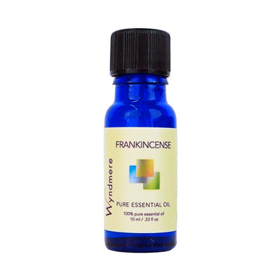 2ml cobalt blue bottle of Wyndmere Frankincense Essential Oil with an earthy, spicy scent.