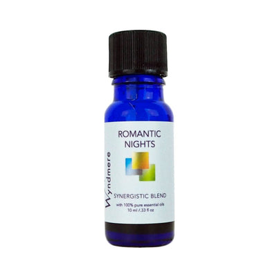 Elegantly fragrant essential oil blend of Romantic Nights in a 10ml cobalt blue bottle.