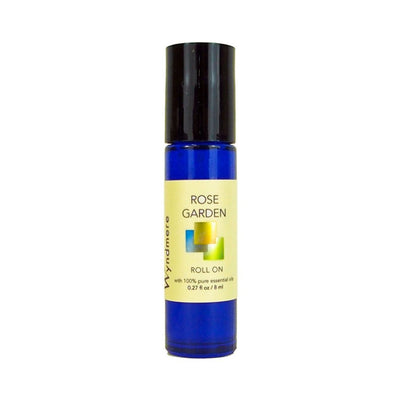An 8ml cobalt blue roll-on bottle of Rose Garden to use as a perfume or encourage positive feelings.