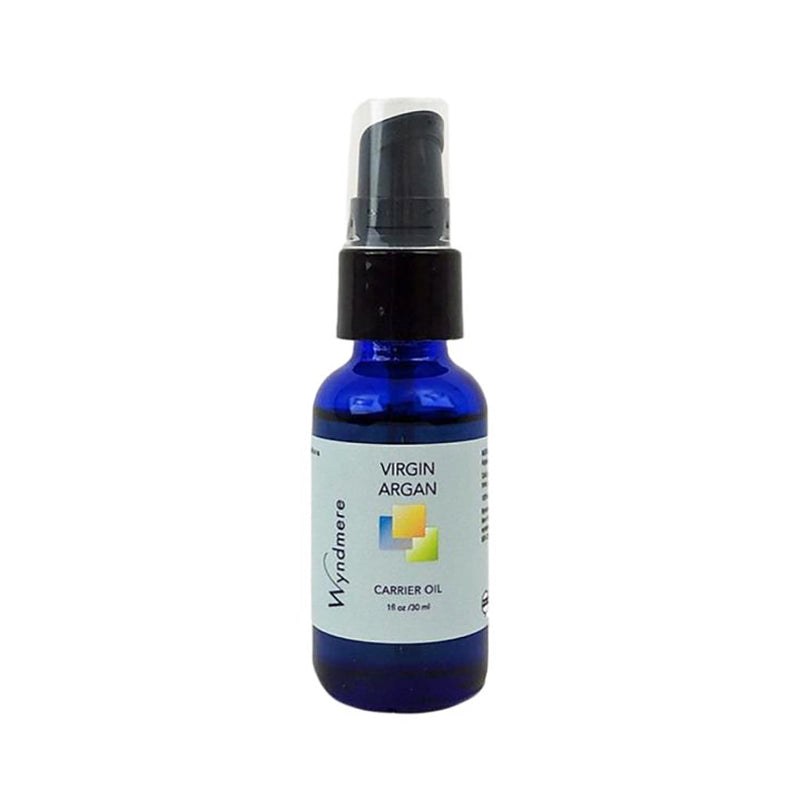 1oz cobalt blue bottle of Wyndmere Virgin Argan Oil with treatment pump