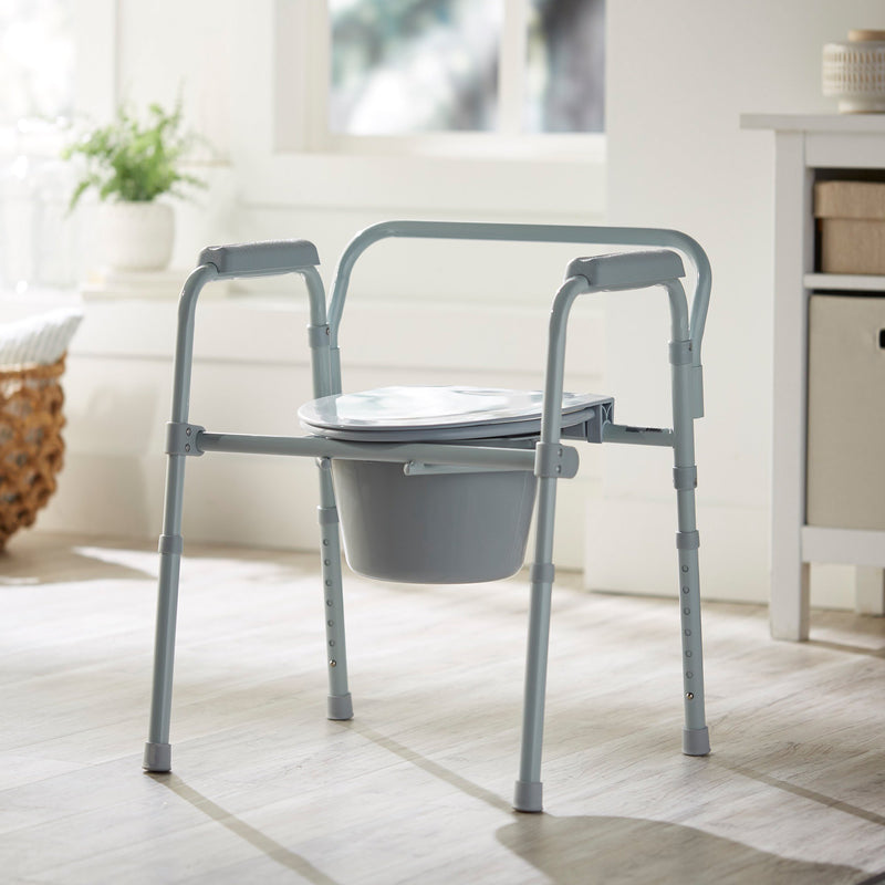 McKesson Folding Fixed Arm Steel Commode Chair, 16-2/3 – 22½ Inch Height
